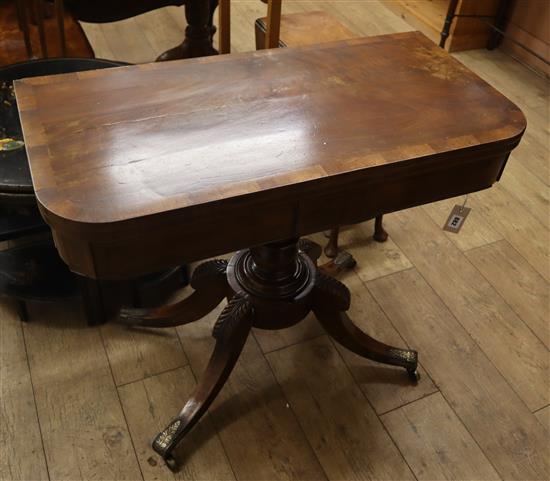 A Regency mahogany folding card table W.91cm